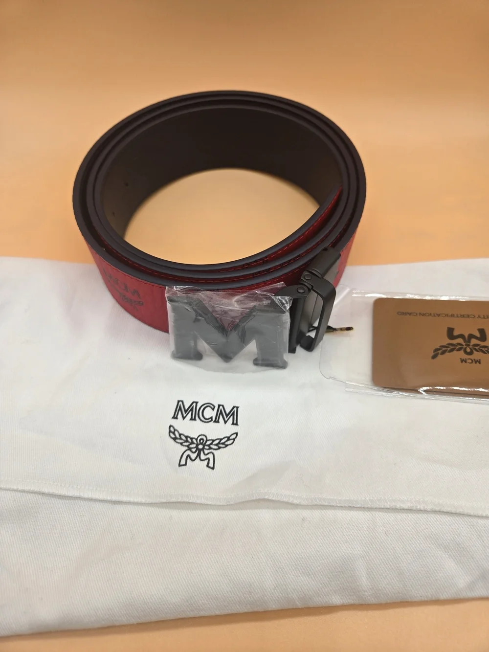 MCM Red Logo Strap Belt with Black 'M' Buckle